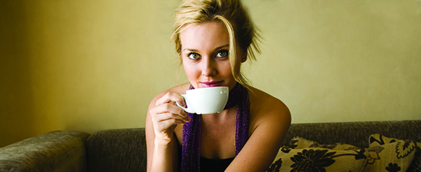 Blonde_female_sipping_coffee